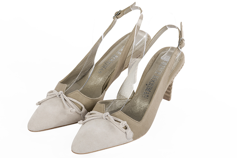 Off white and natural beige women's open back shoes, with a knot. Tapered toe. Medium slim heel. Front view - Florence KOOIJMAN